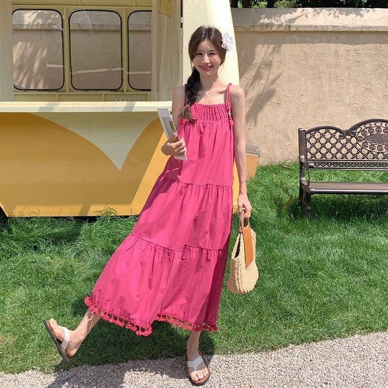 Niche design fringed suspender dress women's summer seaside vacation gentle wind loose and thin temperament long skirt