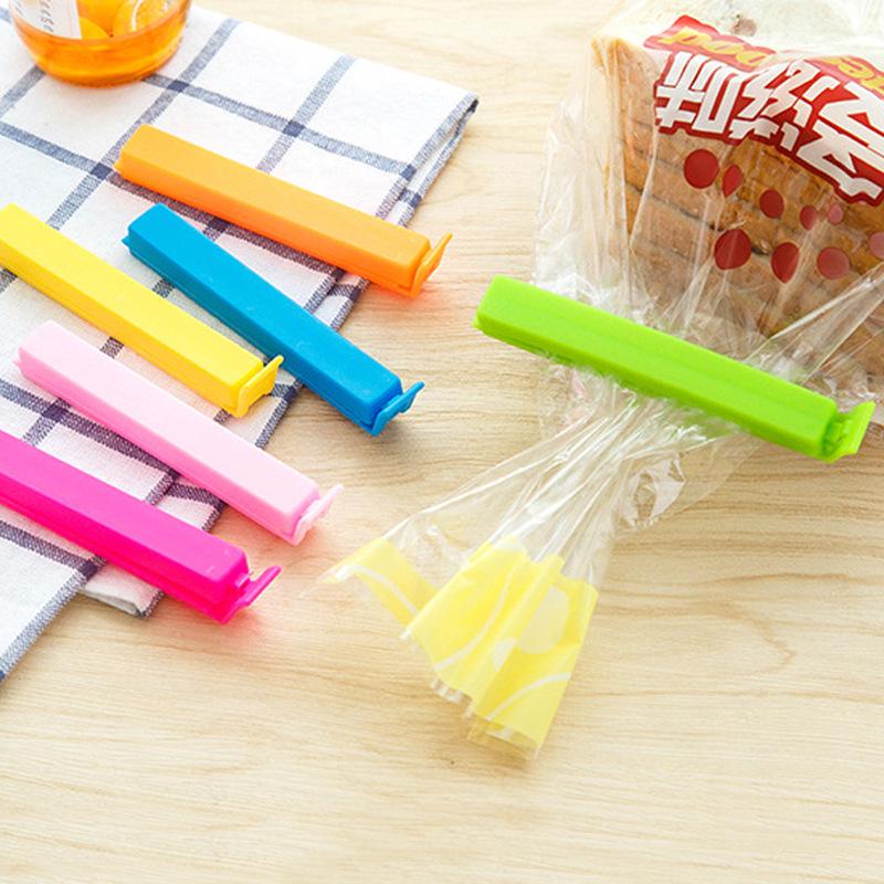 

Пластиковый зажим для герметизации 11 см для сохранения продуктов, пакетов со снеками, чая; Влагоотталкивающий; Доступен настраиваемый логотип розы красного