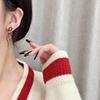 2024 High-End Red Bow Ankola Earrings: Hong Kong Style Niche Design for Women