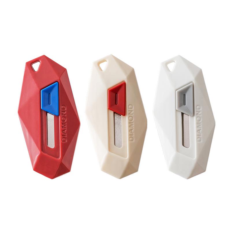 Dopamine Diamond Multifunctional Unboxing Knife: Hand-Safe, Automatic Rebound, Portable Serrated Blade for High-Value Sewing and Unboxing Tasks.