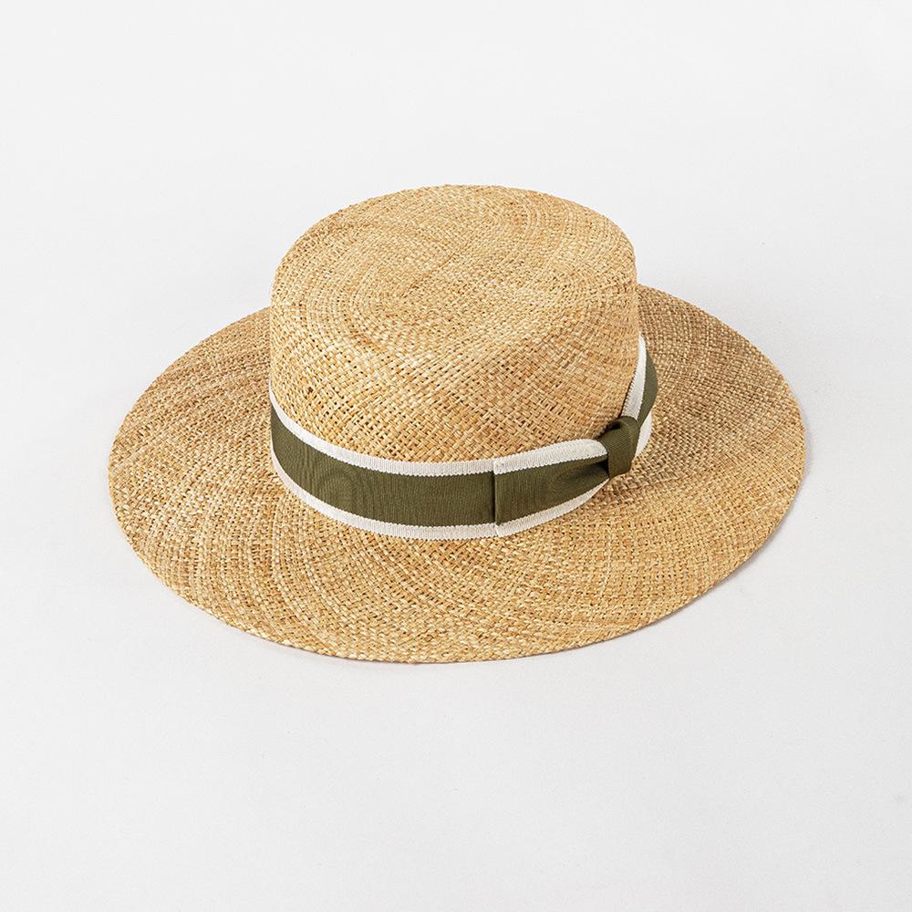 Spring and summer new fashion two-color webbing bow treasure grass wide brim flat top hat outdoor shopping sun protection straw hat