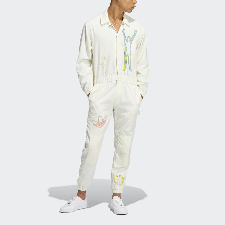 Adidas Originální volná kombinéza s potiskem trojlístku Unisex kombinéza Béžová H43972