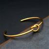 Elegant Geometric Open Knot Bangle Bracelet In Gold Finish Jewelry Accessory for Fashionable Women Seek Unique Styles