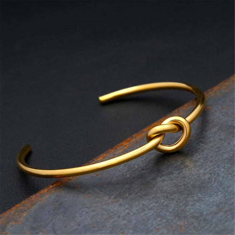 Elegant Geometric Open Knot Bangle Bracelet In Gold Finish Jewelry Accessory for Fashionable Women Seek Unique Styles
