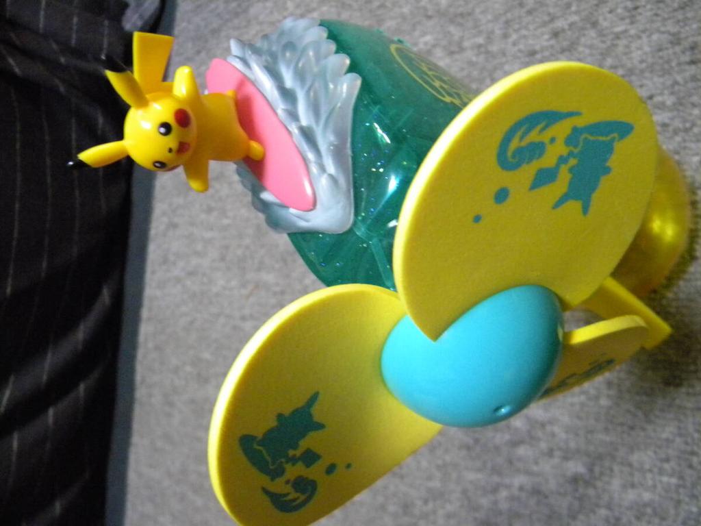It Buy NowPokemon CenterSurfing PikachuMist FanFan/Water