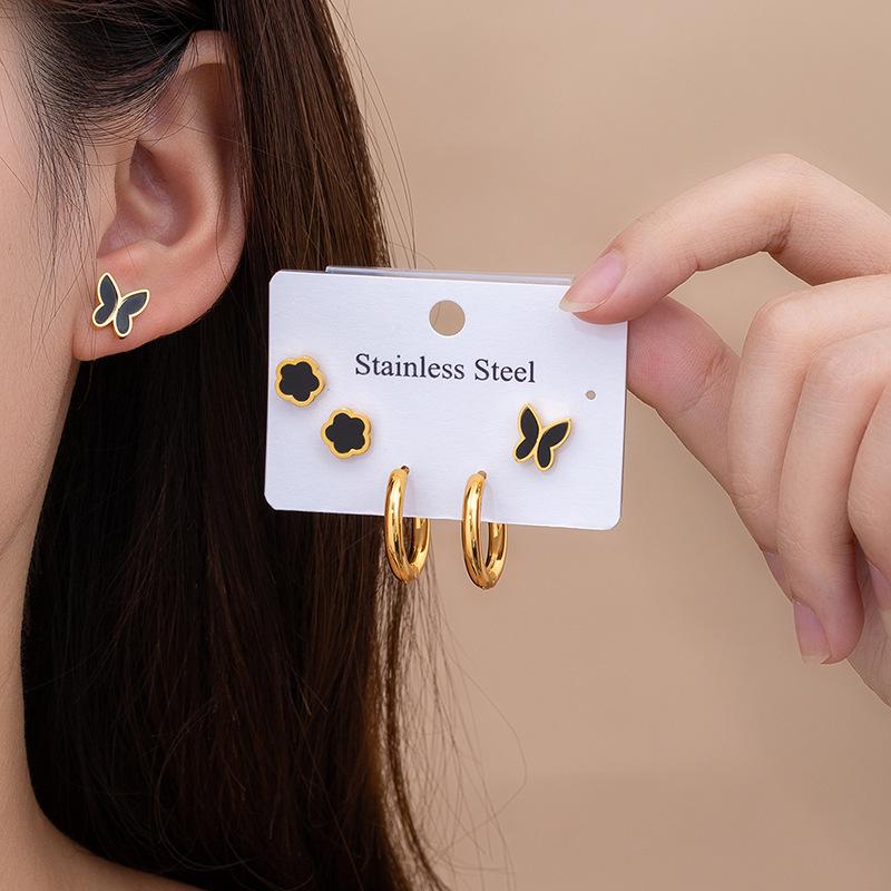 Elegant Four-Leaf Clover & Heart Earrings with Butterfly Detail, Titanium Steel Hoops - Non-Fading, Fashionable Summer Accessory