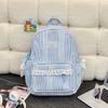 Schoolbag Korean simple casual striped schoolbag female junior high school student backpack large capacity class commuter travel backpack