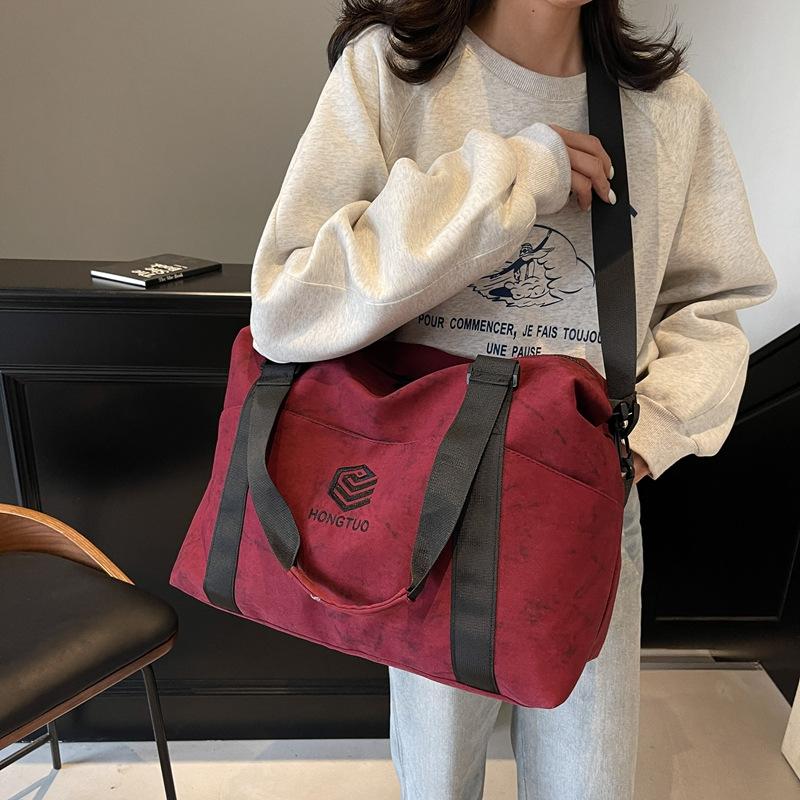 Mehrere Taschen Klassifizierung für Ausflüge und Spielen Tragbare Reisetasche Design zur Trennung von Nass und Trocken Fitness Tasche Kann mit einem Rollkoffer verwendet werden