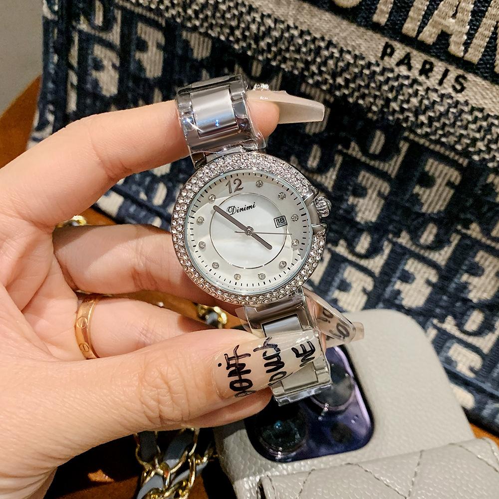 

Новый стиль горный хрусталь мода темперамент легкие роскошные кварцевые часы простые пригородные женские часы со стальным ремешком с календарем