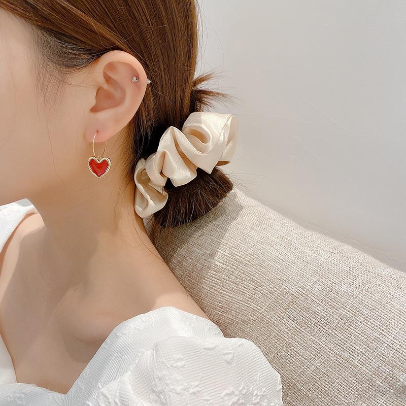 

Wine Red Heart Earrings for Women - Simple Korean Style with Elegant Drop Oil Design.