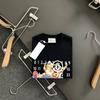 2025 Frühling und Sommer Magila Stil Katze Buchstaben Druck Kurzarm T-Shirt Herren und Damen gleich Nische trendiges Oberteil