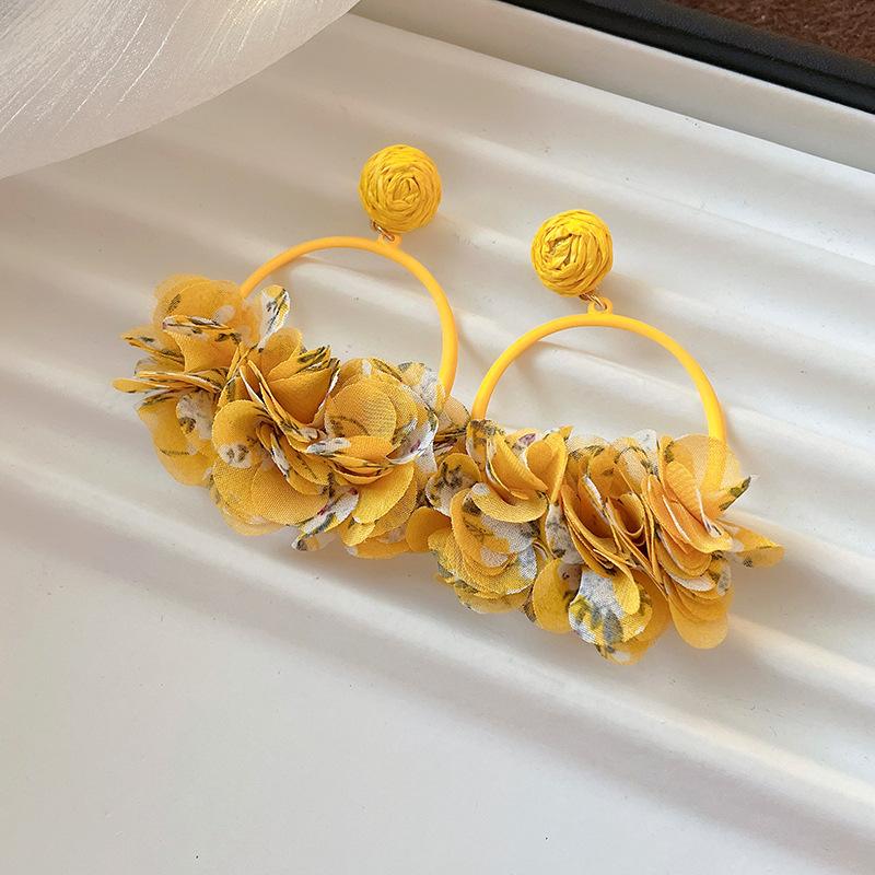 

Steel needle early spring sweet fabric petals round earrings seaside photo exaggerated earrings niche high-end earrings women