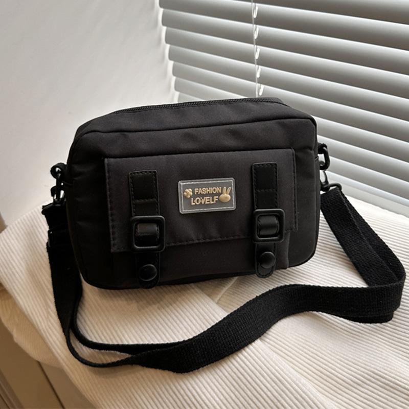 2025 niche vitality girl small fresh youth simple Mori cute canvas oblique span bag woman