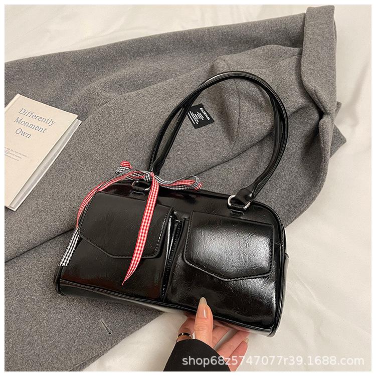 Korean Internet celebrities with the same bowling bag 2025 new niche Boston shoulder bow portable underarm women's bag