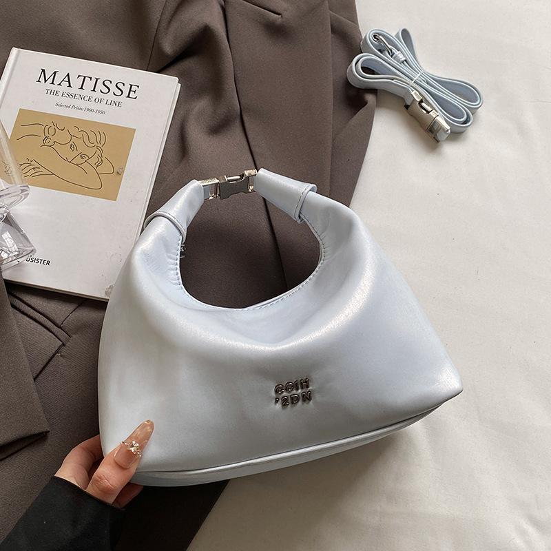 

Корейская версия модной простой высококачественной текстурированной сумки-пельменя на запястье, нишевая повседневная универсальная сумка-мессенджер для поездок на работу, сумка-полумесяц для женщин