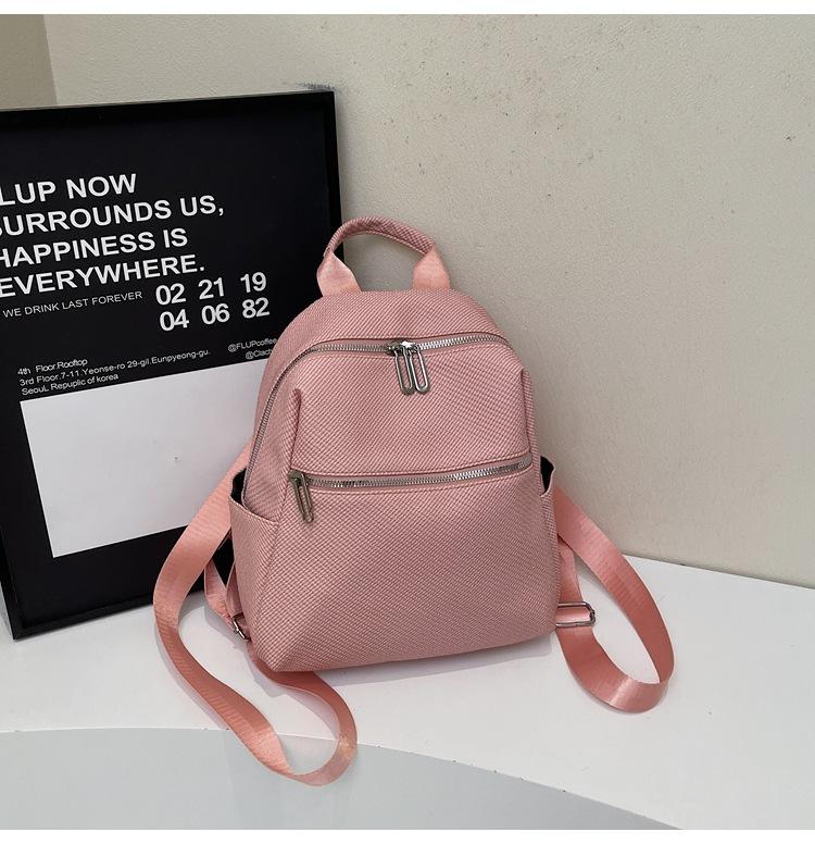 

Korean version of leisure travel backpack 2025 new fashion versatile large capacity simple commuting temperament backpack women рожевий