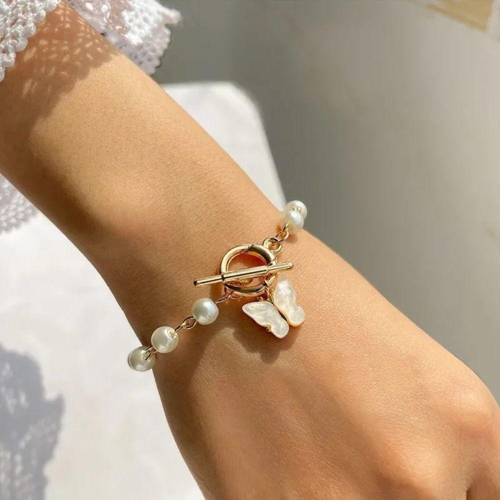 

Fashion Butterfly Pearl Pendant Bracelet Retro Hand Chain Friendship Charm Bracelet Ladies