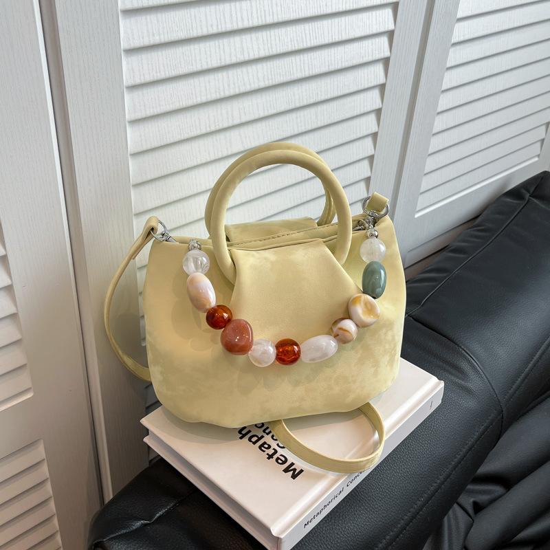 Niche bag women's new summer versatile messenger bag casual pleated portable bucket bag