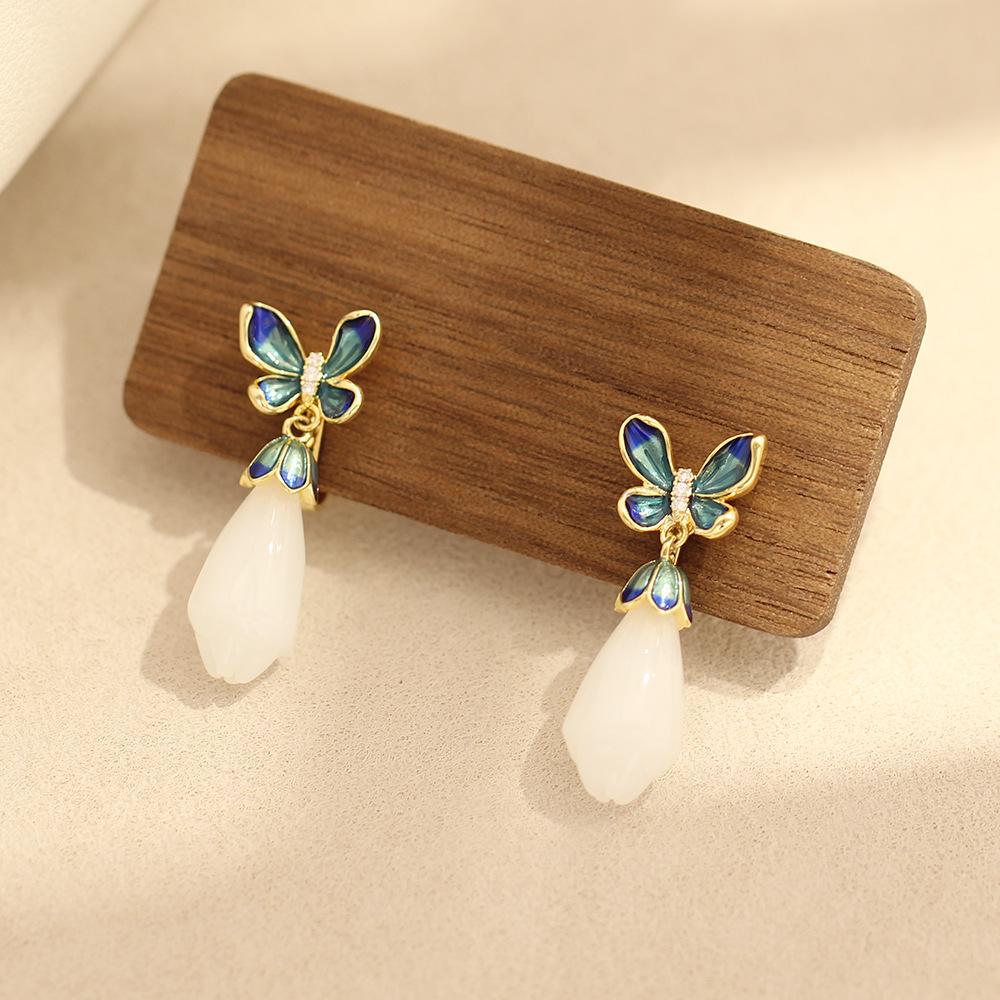 Gericht retro stil tropfendes Öl blaue Schmetterling Ohrringe Magnolienblüten Ohrringe Gold und Silber zweifarbig ohrlose Ohrringe Clips Ohrringe Damen