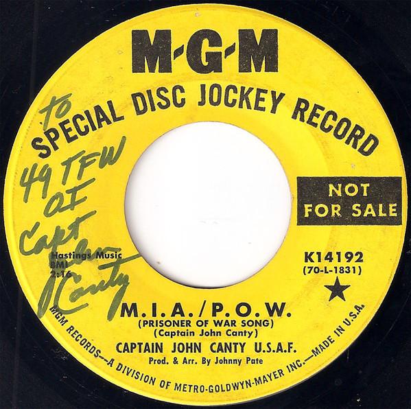 

7-дюймовая пластинка КАПИТАН ДЖОН КАНТИ ВВС США. - М.и.а. / P.o.w. (Военнопленный Так K14192 MGM RECORDS 1970 UK Военный Использованный