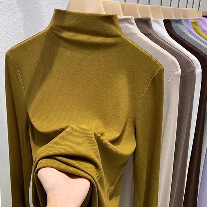 For Autumn and Winter, Women Can Wear A Semi-high-neck Solid-color Base Layer and A Long-sleeved T-shirt Over It for A Slimming Look