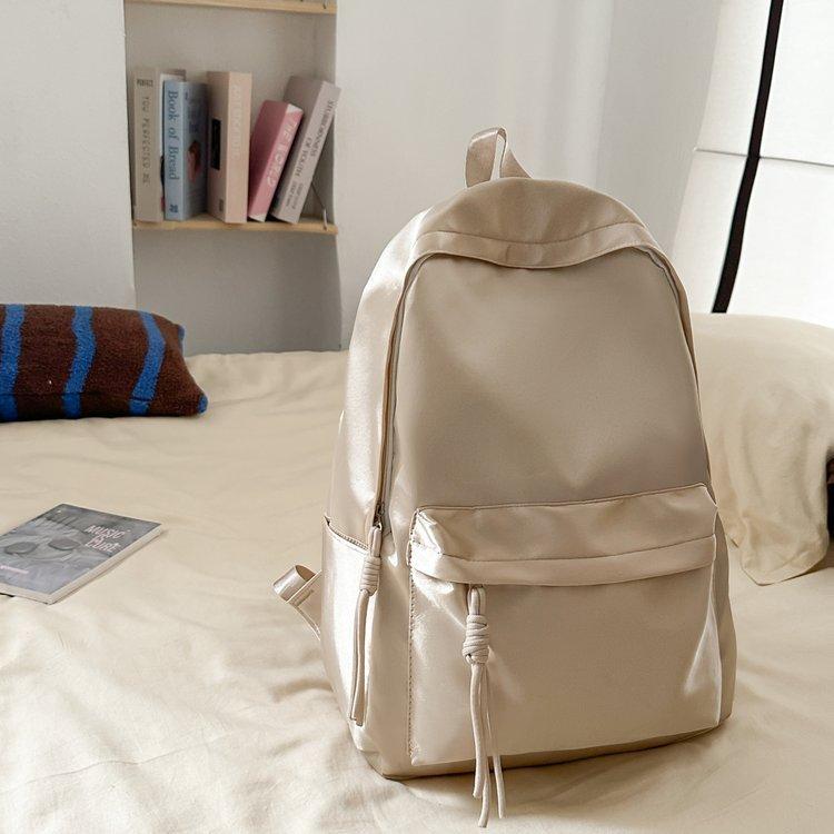 Schoolbag school bag solid color simple college student Japanese versatile backpack ins large capacity girl light backpack lazy wind