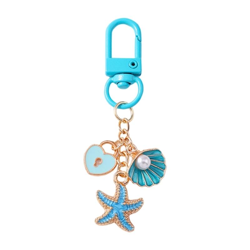 

Stylish Gold Starfish Keychain Featuring Marine Charm and Blue Beach Pendant Perfect Ocean Accessory for Women 1