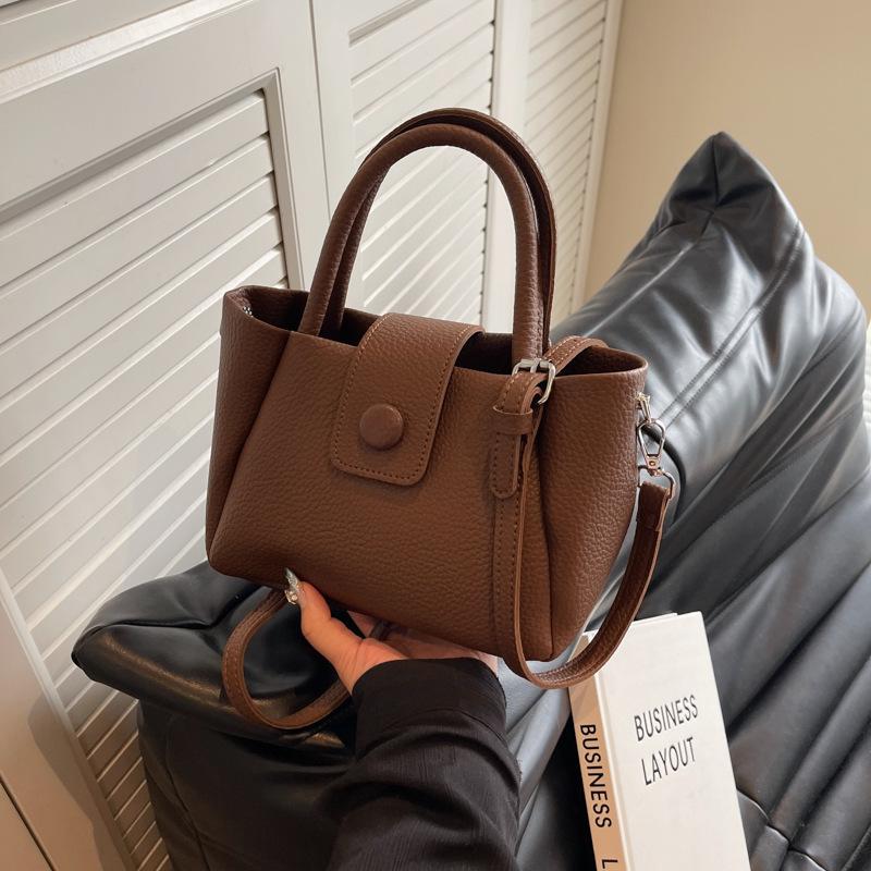 Nisch enkel handväska damväska höst och vinter ny avslappnad enkel hinkväska axelväska