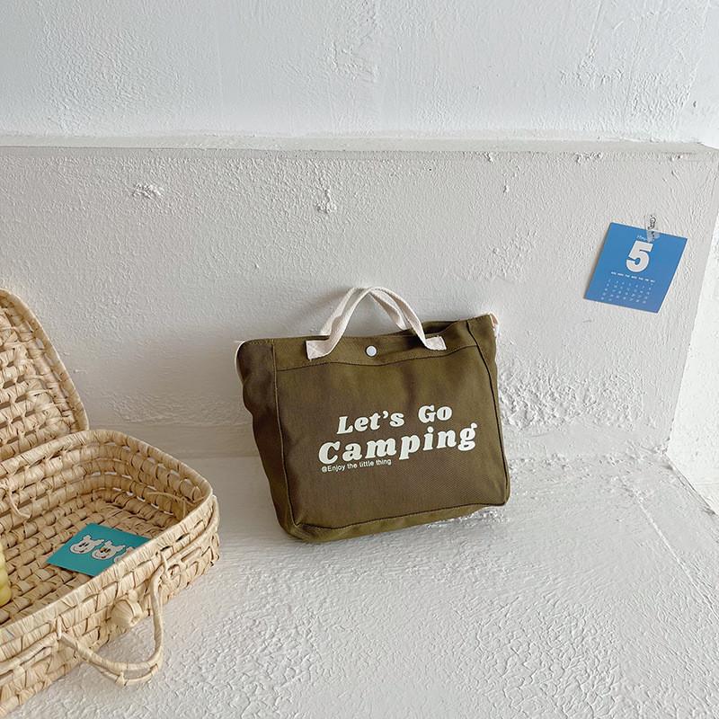 

Modern Large Capacity Canvas Backpack For Kids Featuring Trendy Letter Pattern And Stylish Design зелений