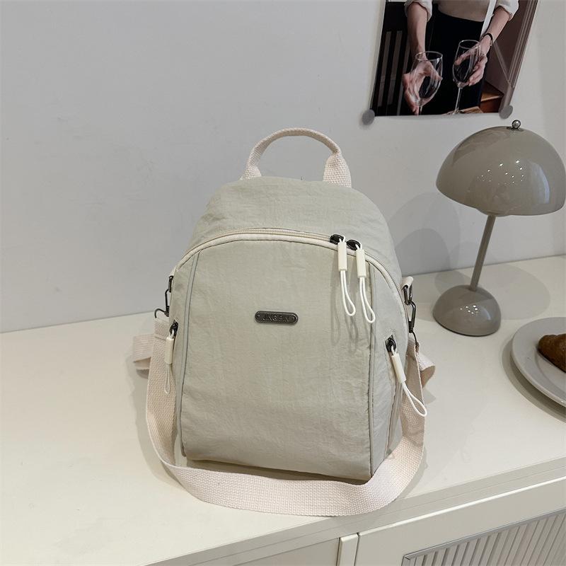 

Solid color casual lightweight student schoolbag commuting going out versatile large capacity backpack portable shoulder backpack білий