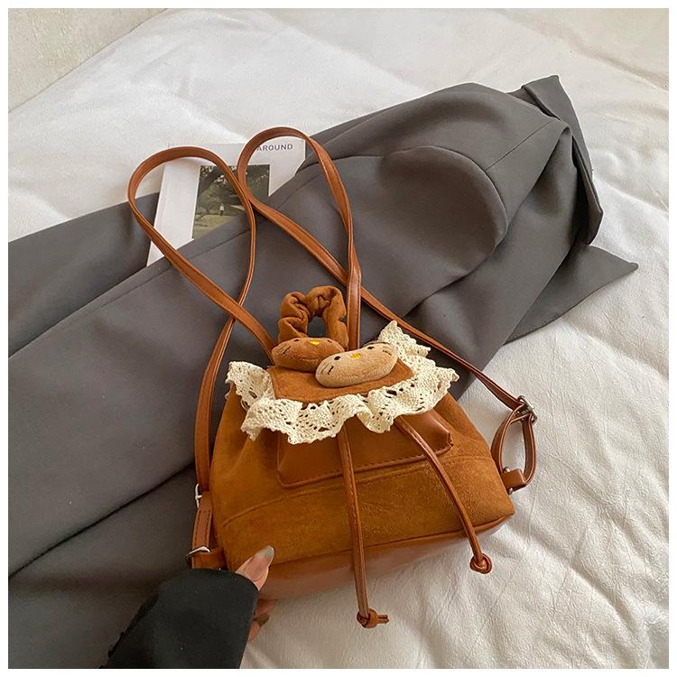 Schoolbag Korean version of high-value cartoon plush doll retro lace backpack women's fashion versatile foreign style travel small backpack