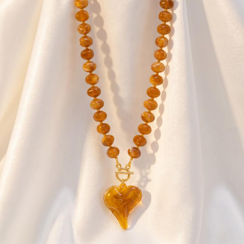 European and American retro amber ins big love pendant necklace, simple and exaggerated Maillard smudged round bead necklace