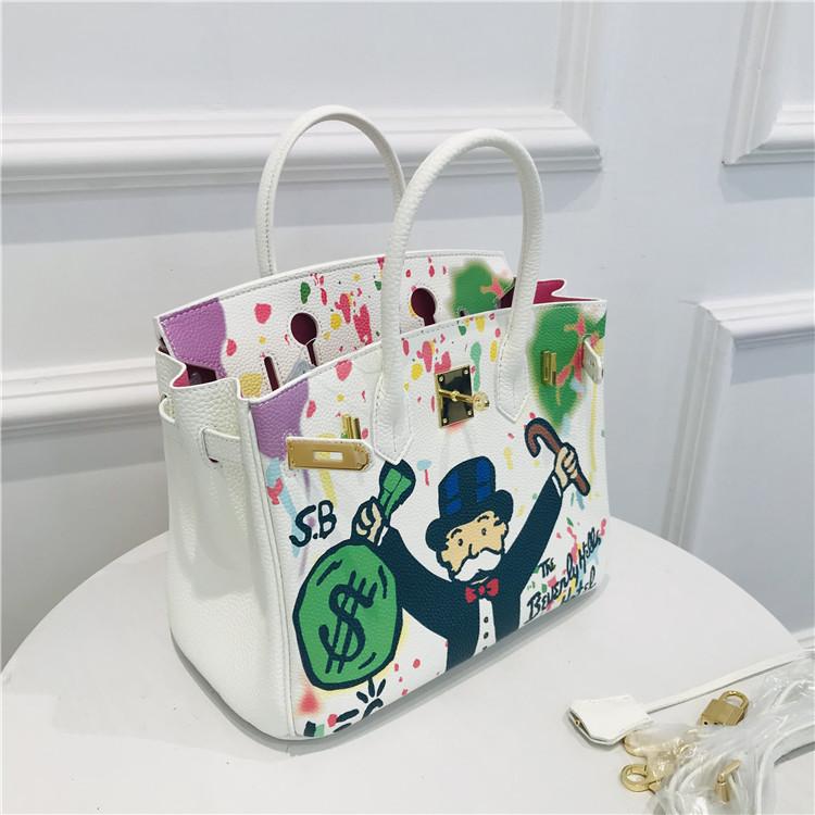 2021 New platinum bag first layer cowhide painted spray painting graffiti bag portable shoulder messenger bag personalized women's bag tide