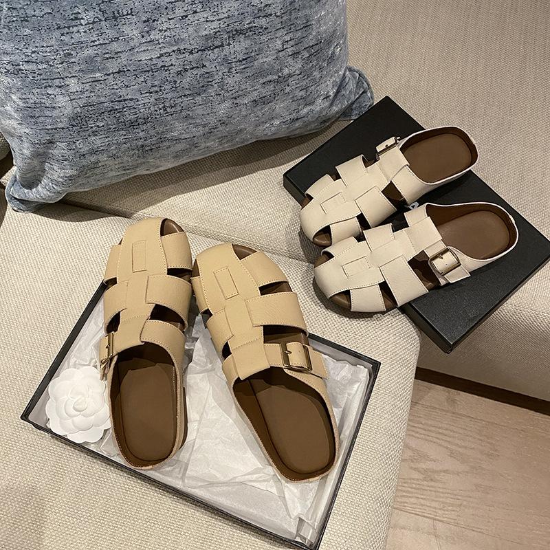 

Home factory retro Roman baotou half slippers women s outer wear cover-up leather woven hollow flat-bottomed pig cage sandals 39