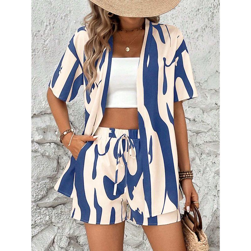 

Модный стиль Изящный и модный принт Рукав «летучая мышь» Комбинезон с широкими брюками Женский Летний Новинка Высокая талия Приталенный вид Свободные брюки Blue L