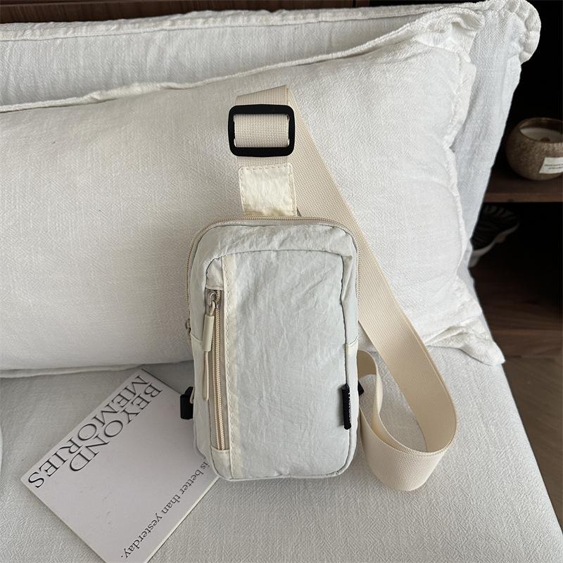 New sports go out light backpack messenger bag mobile phone bag portable fashion shoulder bag men's and women's bags