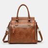 New women's bags, messenger bags, niche portable shoulder bags, large-capacity tote bags, versatile autumn and winter commuter bags.