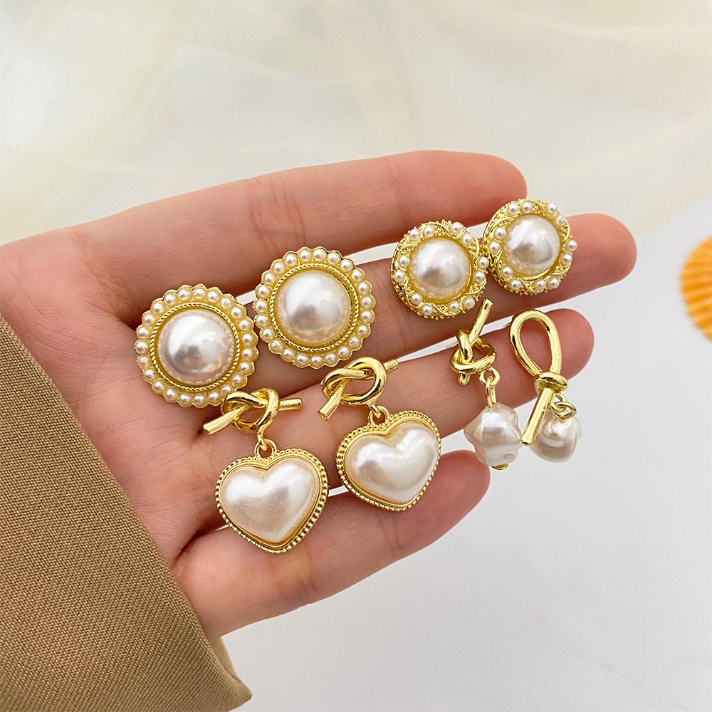 Boucles d'oreilles élégantes de couleur or pour femmes, tempérament blanc, boucles d'oreilles irrégulières, bijoux tendance, cadeaux