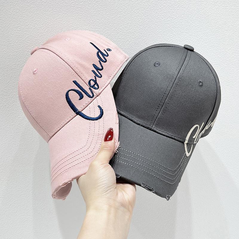 The new fashionable baseball cap is a versatile accessory for women in spring and summer. It features a large brim, which not only provides sun