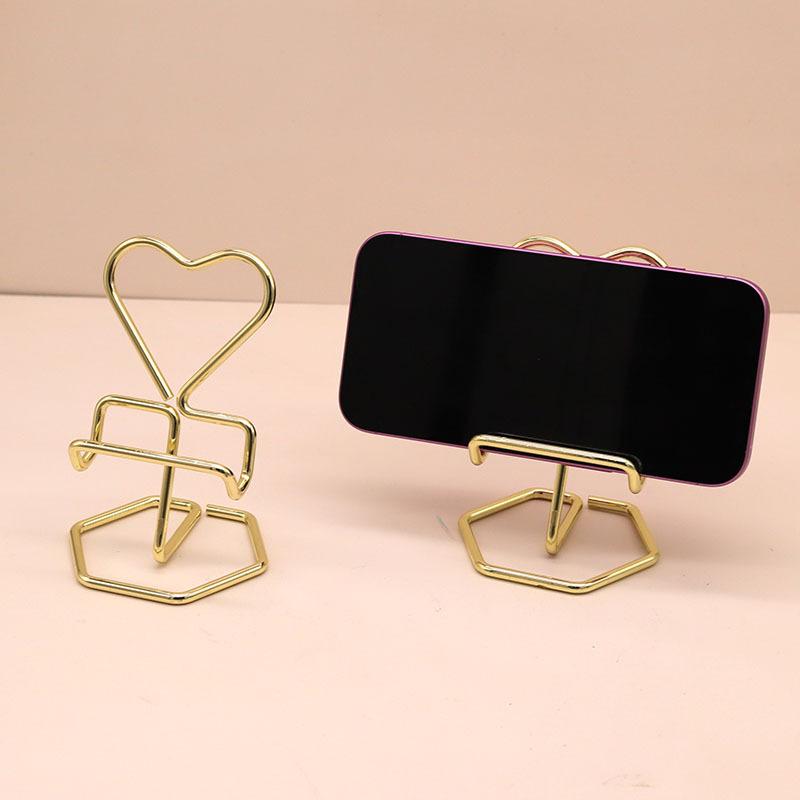 Support de téléphone en métal en forme de cœur Mode Support pour téléphone portable de bureau Support paresseux Organisateur Pour bureau Chambre à coucher Regarder des vidéos Décor