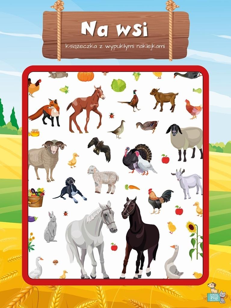 A book with raised stickers. In the countryside.