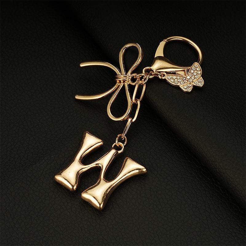 Chaveiro Fashion Borboleta Letra A-Z Feminino Menina Brilhante Fofo Mochila Chave de Carro Acessórios Cordão Pingente de Metal com Letra Presente