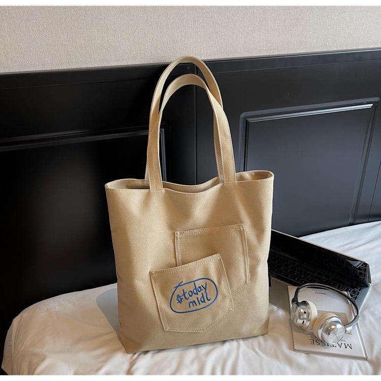 

Canvas bag large-capacity student commuting thickened shoulder bag new Korean version casual and lightweight shoulder bag tote bag women хаки