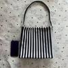 Stylish Striped Canvas - Roomy And Adaptable - Perfect for The Office, Classes, Or a Day Trip.