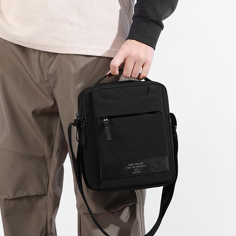 Nylonová crossbody taška s horním uchem a přední kapsou na zip pro muže i ženy pro každodenní použití