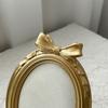 Elegant Bowknot Shape Resin Jewelry Display Holder Suitable for Necklace Earring Storage and Decorative Showcase