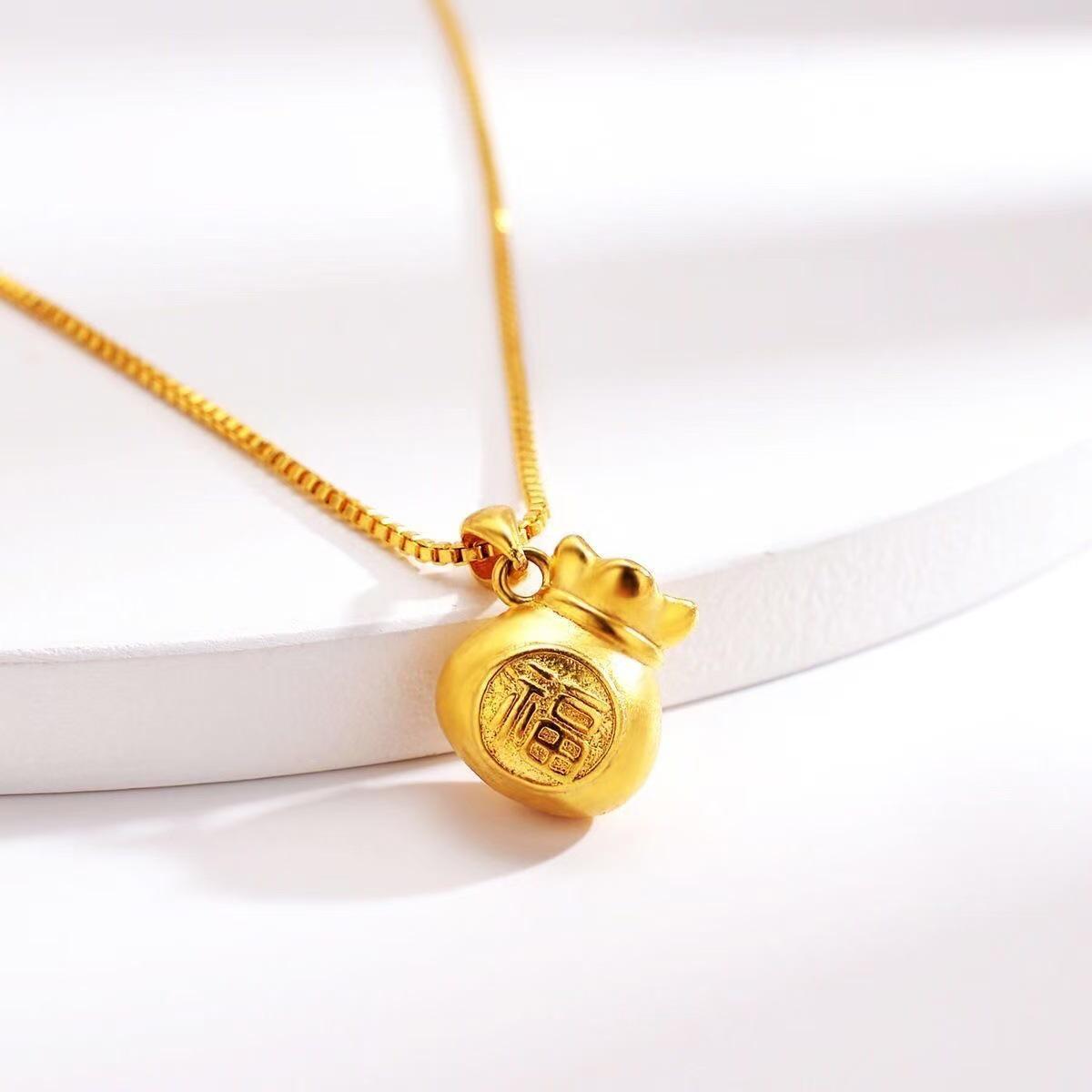 

Elegant Women s Gold Box Chain Necklace with Versatile Lucky Bag Pendant