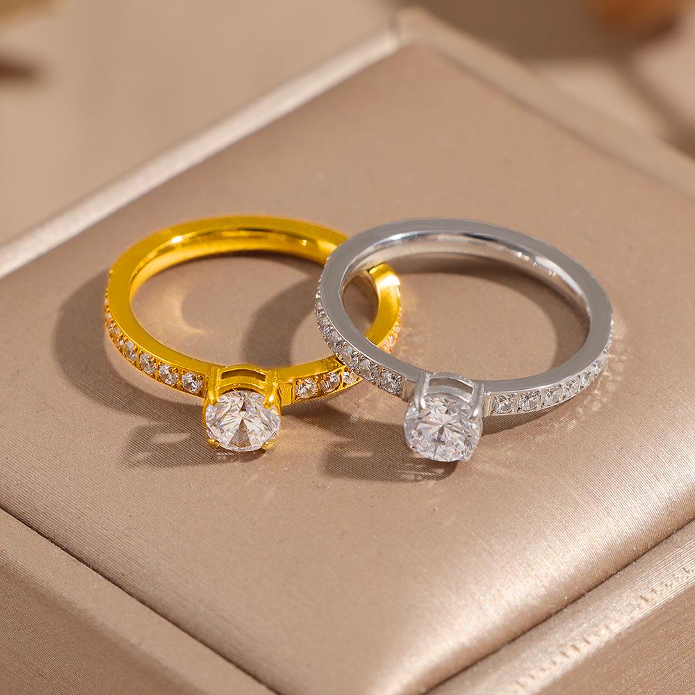 2026 Four-Prong Zirconia Inlaid Titanium Steel Unisex Ring - Light Luxury High-End Feel
