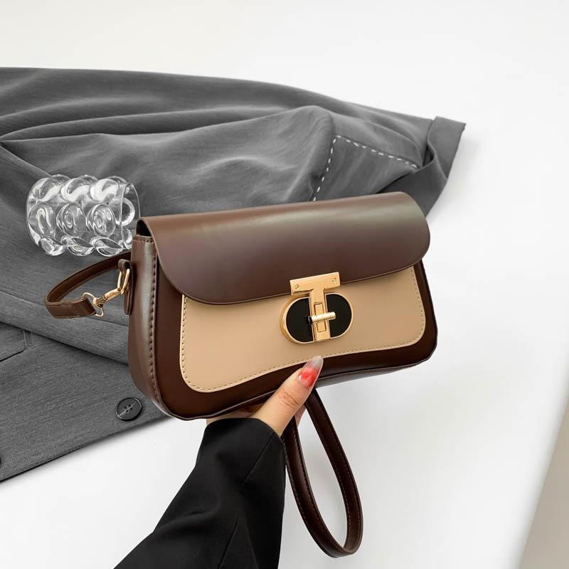 Neue leichte Luxusmode kleine quadratische Tasche, personalisiertes Trend-Nischendesign, einzelne Schulter Umhängetasche Pendlertasche Frau