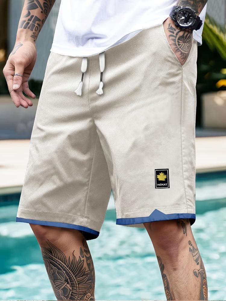 Modische Zweifarbige Herren-Freizeit-Sportshorts mit Kordelzug, Taschen und Prints, Perfekt für Outdoor-Aktivitäten und die Freizeit im Sommer